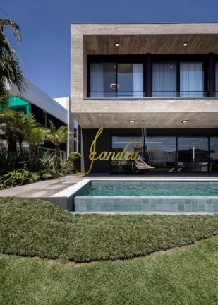 Imagem Casa condomínio com 05 suites e piscina beira de lago