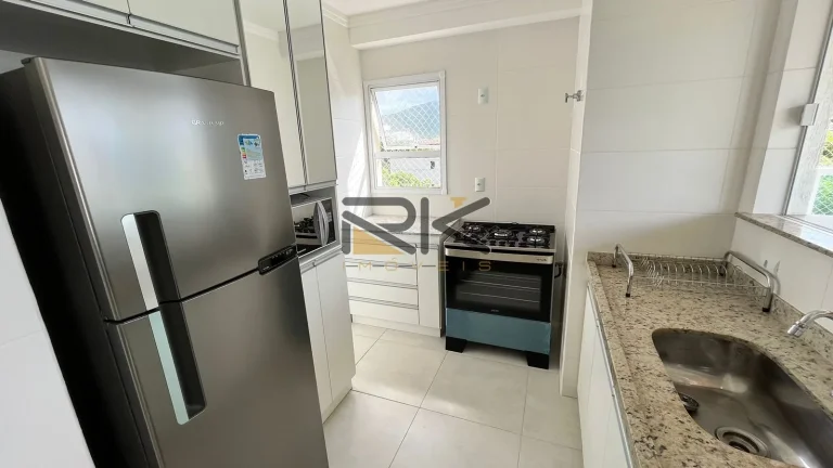 Imagem Apartamento Itaguá 2 dormitórios sendo 1 suíte,1 banheiro social, 2 vagas de garagem,varanda gourmet com churrasqueira