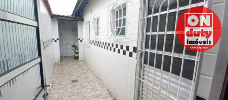 Imagem Casa com 2 dormitórios à venda, 70 m² por R$ 370.000,00 - Vila São Jorge - São Vicente/SP