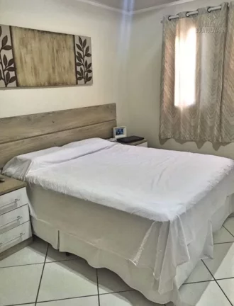 Imagem Casa térrea 3 dormitórios no bairro Tude Bastos
