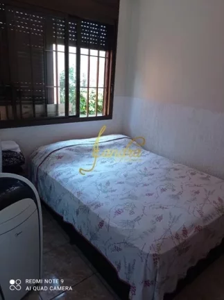 Imagem Casa composta por 03 dormitórios um sendo suíte