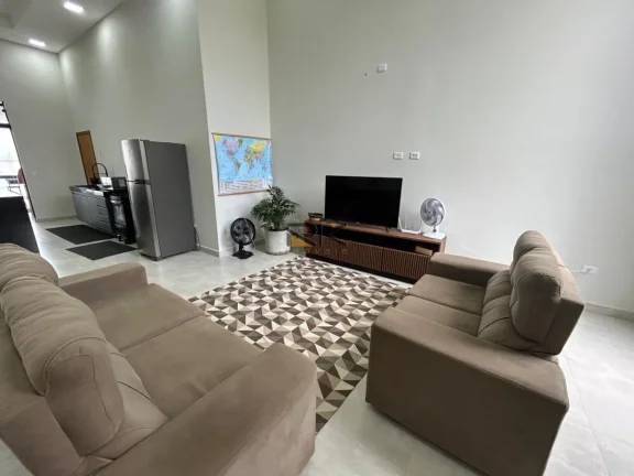 Imagem CASA EM CONDOMINIO FECHADO COM 4 DORMITÓRIOS SENDO 4 SUÍTES,2 VAGAS DE GARAGEM,VARANDA GOURMET COM CHURRASQUEIRA E PISCINA.