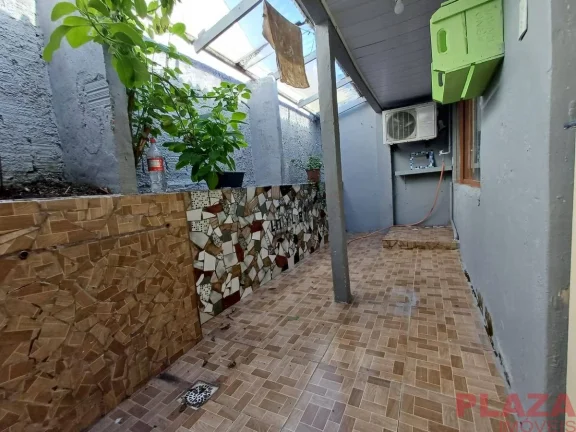 Imagem Casa com Churrasqueira – 1 Quarto | 1 Vaga | Bairro Tabuleiro – Camboriú