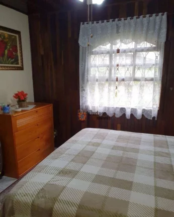 Imagem Casa com 3 dormitórios à venda, 235 m² por R$ 1.250.000,00 - Alto Do Capivari - Campos do Jordão/SP