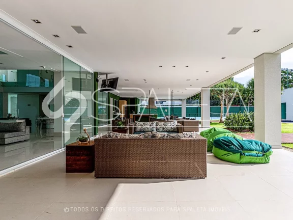 Imagem Mansão contemporânea com heliponto particular à venda no condomínio Jardim Acapulco no Guarujá