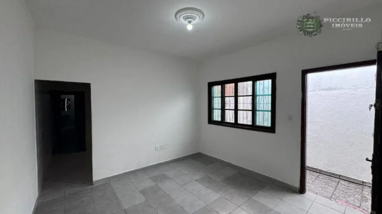 Imagem Casa com 3 dormitórios à venda, 71 m² por R$ 590.000 - Vila Guilhermina - Praia Grande/SP