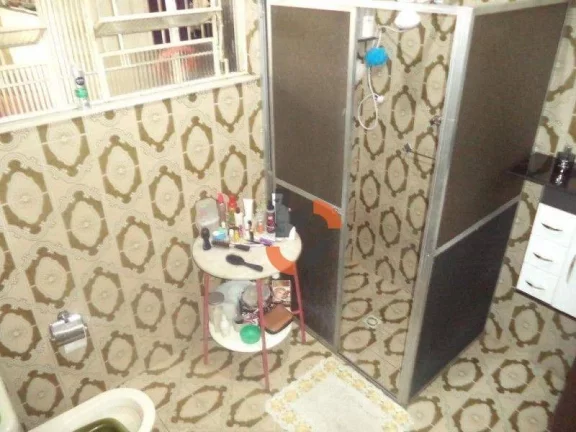 Imagem Oportunidade no Centro de NI: Casa Térrea com 2 Vagas a Pé do Calçadão