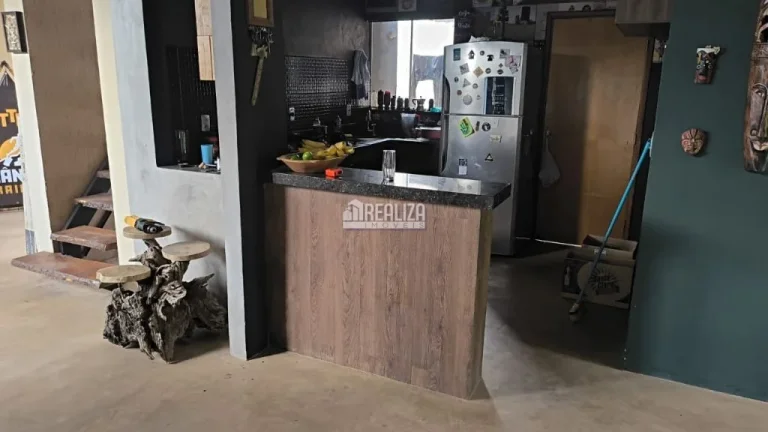 Imagem Casa à venda em Uberaba - 3 dormitórios, móveis planejados e quintal com grama!