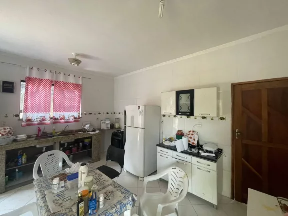 Imagem Casa à Venda em Aruana I: 3 Suítes, Área Gourmet, Próximo à Praia!