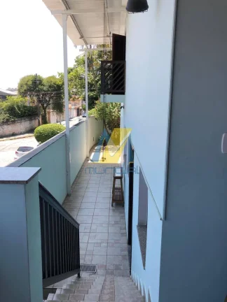 Imagem Sobrado amplo com 3 suítes, renda garantida e 6 vagas cobertas