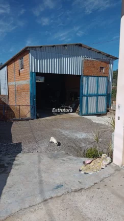 Casa em Pinhal Grande com Pavilhão onde funciona uma borracharia e uma lavagem,