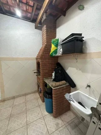 Imagem Sobrado com 3 dormitórios à venda, 125 m² por R$ 650.000 - Caiçara - Praia Grande/SP