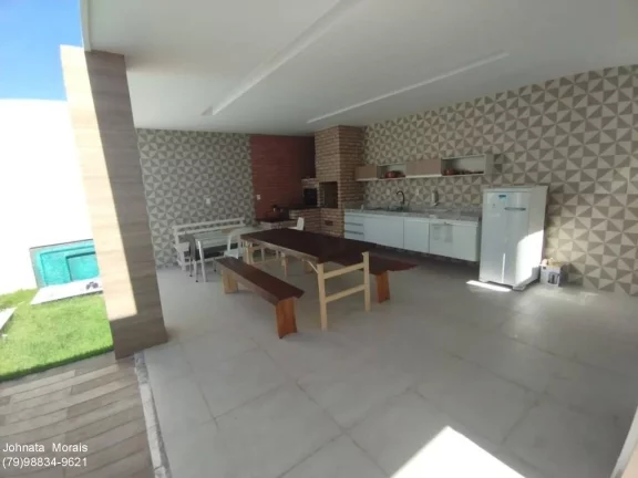 Imagem Casa de Alto Padrão na Aruana: 5 quartos, 4 suítes, posição Leste - Confira!