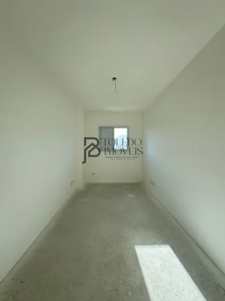 Imagem Apartamento de 2 dormitórios sendo 1 suíte, prédio frente mar no bairro Vila Mirim - Praia Grande