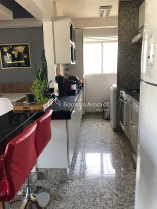 Imagem Apartamento de 75 m² em andar alto, com três quartos sendo uma suíte, sala para dois ambientes e ...