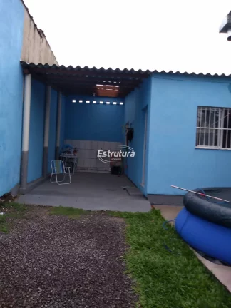 Terreno com duas casas amplas no bairro Pé de Plátano