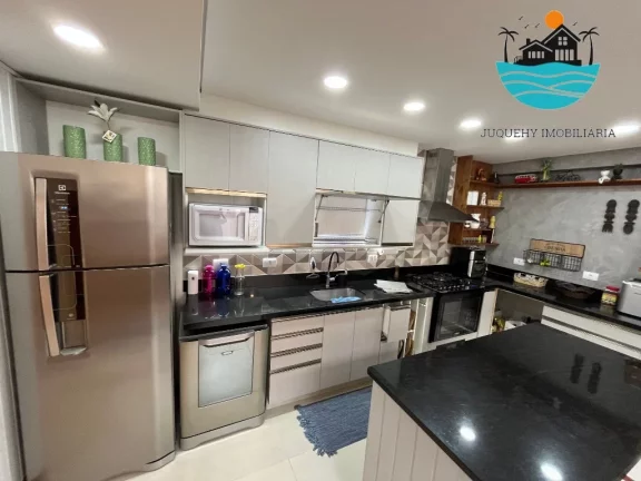 Imagem Casa em Juquehy para alugar - condomínio fechado com 5 suítes, 3 vagas, 100m da praia - Acomodação máx. 12 pessoas | Juquehy Imobiliária.