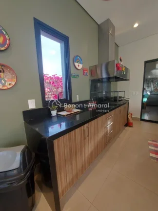 Imagem Encante-se com esta belíssima residência de 295,84m² de construção, projetada para oferecer con...