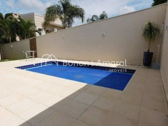 Imagem Casa em condomínio com 410 m² e 4 quartos