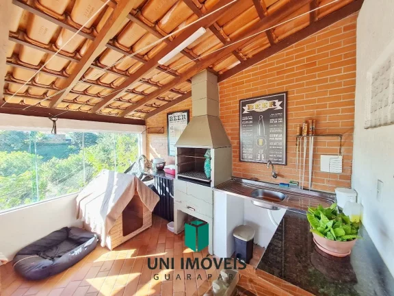 Imagem Linda casa com piscina, jardim e 902m² de terreno a venda na Enseada Verde - Guarapari