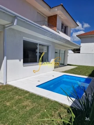 Imagem Sobrado novo, com 04 suítes uma sendo térrea e piscina