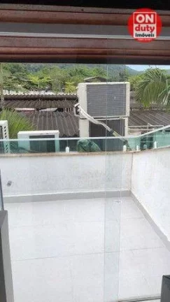 Imagem Sobrado com 3 dormitórios à venda, 150 m² por R$ 1.100.000,00 - Cidade Jardim Tom - Guarujá/SP