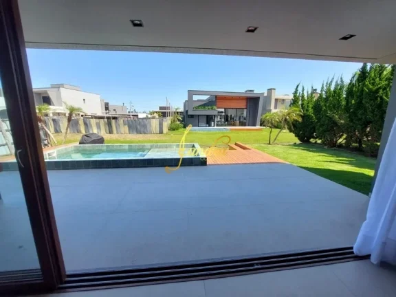 Imagem Sobrado beira de lago com 05 suítes piscina mobiliado e decorado
