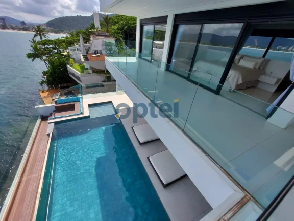 Imagem MANSÃO FRENTE PARA O MAR ,1000 M², 06 DORMITÓRIOS COM 06 SUITES, PISCINA BORDA INFINITA- PENINSULA GUARUJA