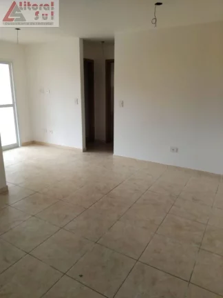 Imagem Apartamento à venda na Guilhermina, Praia Grande-SP: 2 quartos, 1 suíte, 1 vaga de garagem e 56m² de área. Adquira já!
