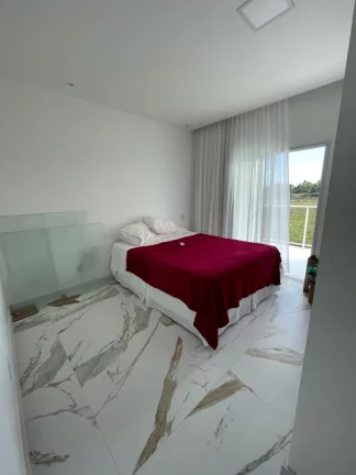 Imagem Casa à venda no Condomínio Biratan Carvalho - Confira as incríveis 4 suítes e espaço gourmet!