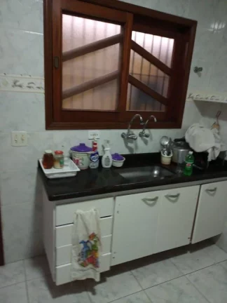 Imagem Casa com 2 dormitórios à venda, 72 m² por R$ 450.000 - Caiçara - Praia Grande/SP