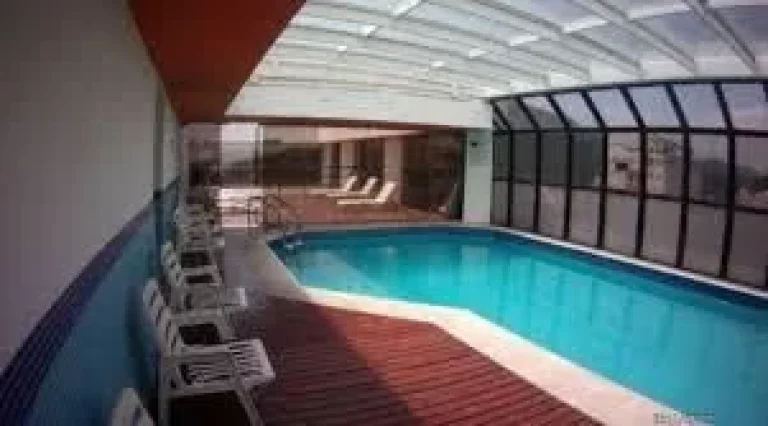 Imagem Flat com 2 dormitórios à venda, 65 m² - Pitangueiras - Guarujá/SP