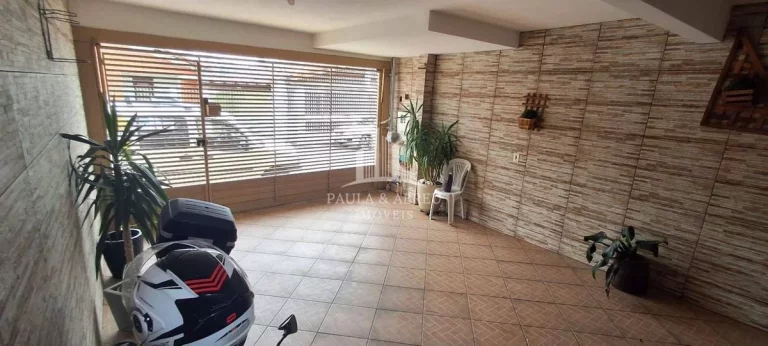 Imagem Assobradado 3 Dormitórios sendo 1 suíte com Sacada, 2 banheiros, 2 vagas, Lavanderia Grande, Área Coberta com Churrasqueira em Mauá no Jardim Zaíra 2