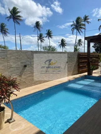 Imagem Vendo casa em condomínio fechado, no Conde com 300 m², 5 quartos sendo 3 suítes