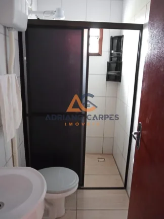 Imagem Casa com 2 dormitórios localizada no bairro Porto escalvados, em Navegantes - Adriano Carpes Imóveis Vende