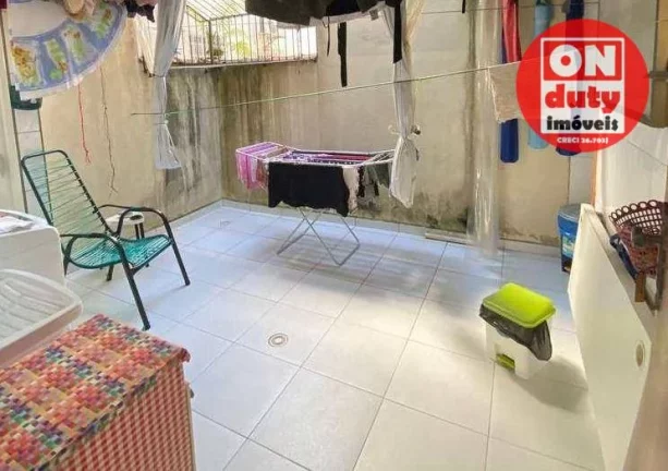 Imagem Casa com 3 dormitórios à venda por R$ 950.000,00 - Estuário - Santos/SP