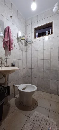 Imagem Casa à Venda no Jardim Esperança em Patos de Minas – 3 Quartos, Suíte e Área Gourmet