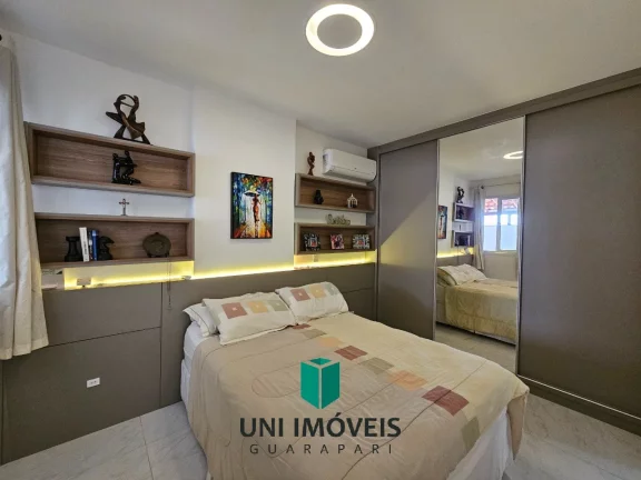 Imagem Vendo apto 2 suítes, tendo 80m² de área lateral, prédio novo com elevador, na Praia do Morro !