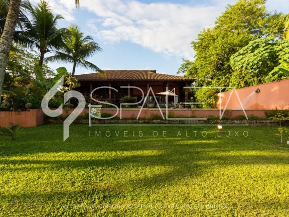 Imagem Lindíssima residência com golfe no quintal e vista sensacional para o lago à venda no Guarujá Golf Club