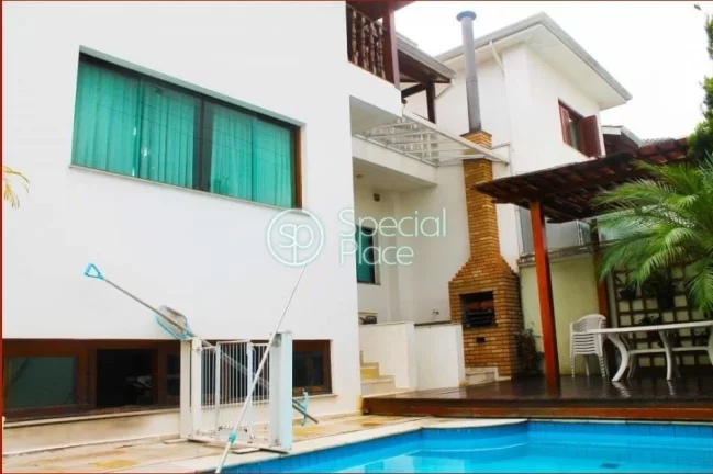 Imagem Casa de condomínio de alto padrão com 4 Suites com armários, escritório, Varanda, Living 2 ambie...