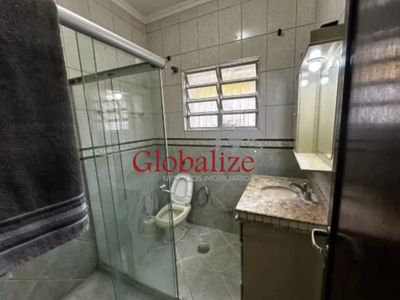 Imagem Casa à venda com 275m², 4 quartos, 4 vagas, piscina, churrasqueira por R$ 609.000,00 no Bom Retiro - Santos
