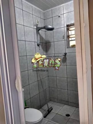 Imagem CASA À VENDA COM 3 SUÍTES ITANHAÉM