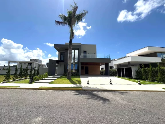 Imagem Casa nova no Condomínio Caledônia com 4 suítes e 4 vagas de garagem em Camboriú SC