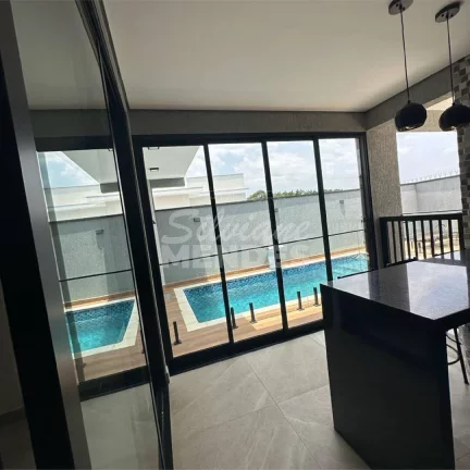 Imagem Casa com piscina aquecida no condomínio Santinon