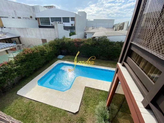 Imagem Sobrado no Centro de Xangri-la com 05 dormitórios com piscina