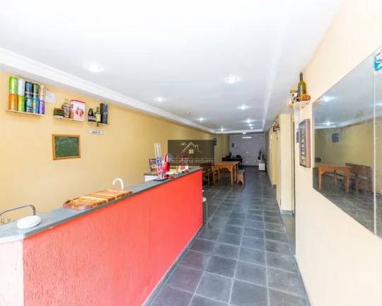 Imagem ÓTIMO SOBRADO 3 DORMITÓRIOS SENDO 1 SUÍTE HIDRO SALA 2 AMBIENTES LAREIRA PISO EM MADEIRA DE LEI COPA COZINHA ÁREA GOURMET SALÃO FESTAS 3 VAGAS