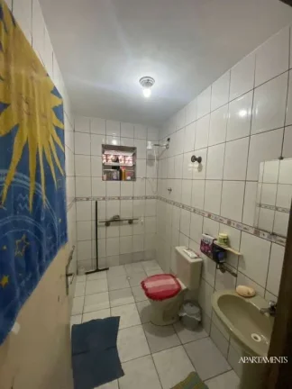 Imagem Terreno com 3 Casas com 3 vagas de carro e moto.