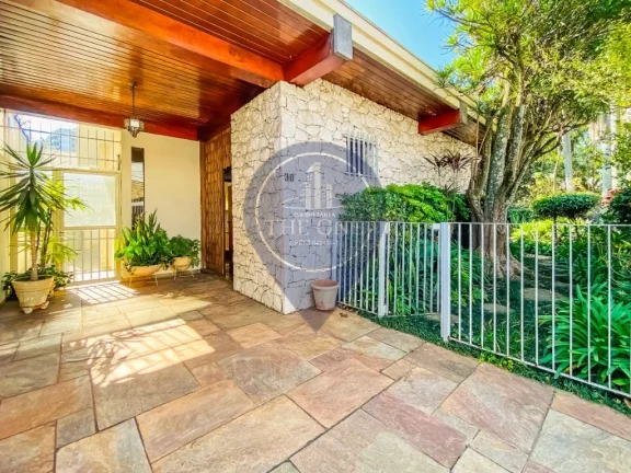 Imagem Imóvel de luxo à venda em São Paulo-SP: Casa de 4 quartos, 2 suítes, 2 salas, 6 banheiros, 5 vagas no Bosque da Saúde - 508m².
