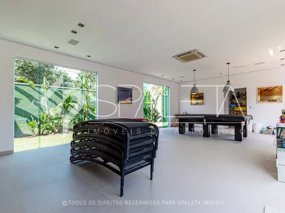 Imagem Mansão contemporânea com heliponto particular à venda no condomínio Jardim Acapulco no Guarujá