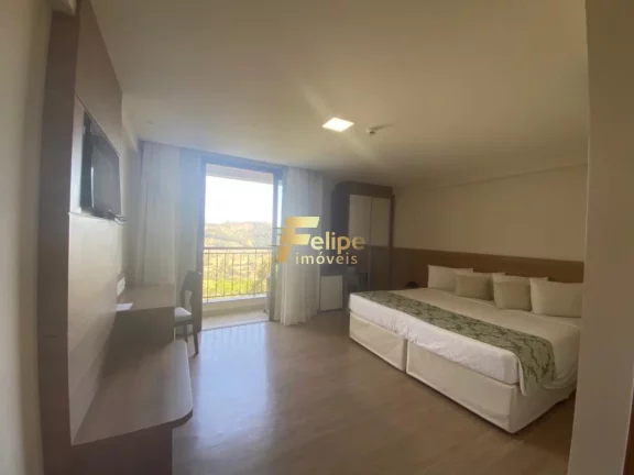 Imagem 1 QUARTO EM DESLUMBRANTE COM VISTA PARA A PEDRA AZUL.